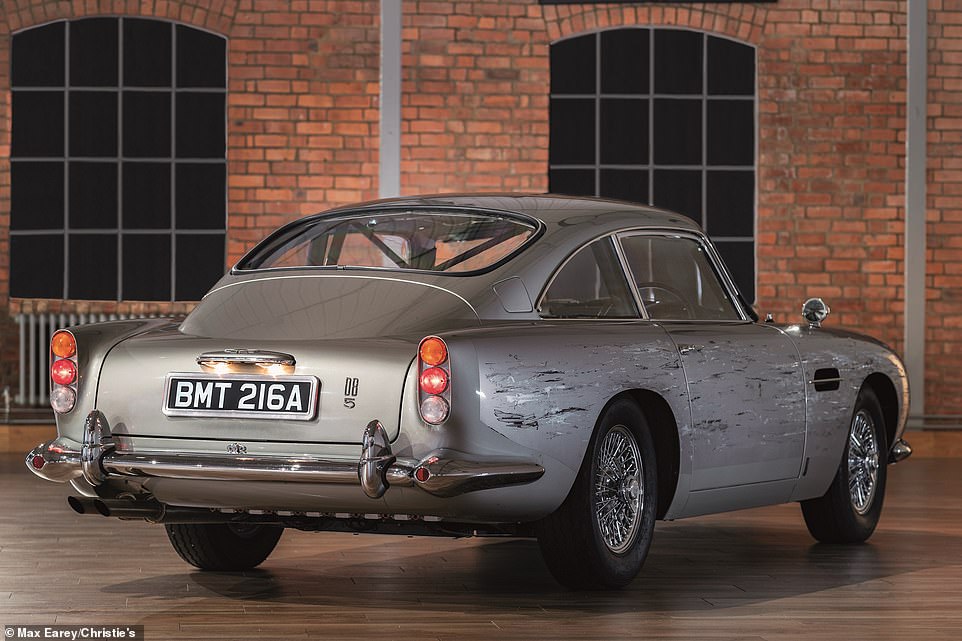 Christie's has put an estimate of £1,500,000 to £2,000,000 on the Aston Martin DB5 replica, which goes under the hammer on 28 September along with a host of other Bond-related items being sold for charity