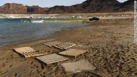 Wooden pallets mark the location of where a barrel containing human remains was found. 