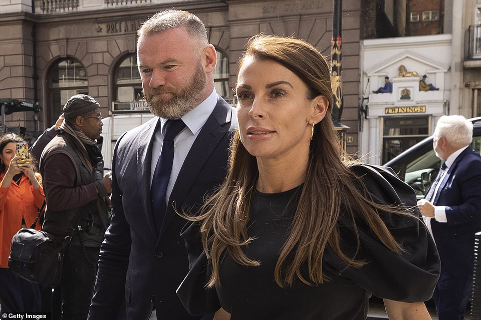 Mrs Rooney pictured arriving with husband Wayne to the High Court in London in May earlier this year