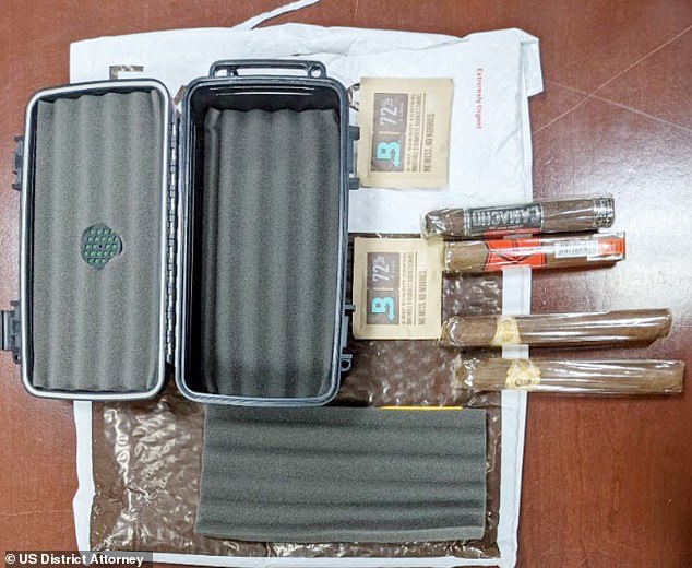 Items seized in the investigation of Taherzadeh and Ali included package containing a cigar case with four cigars