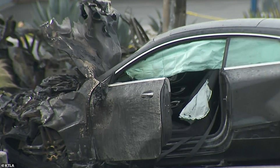 The doomed vehicle fails to break as it bears down on the traffic flowing both ways across the packed intersection