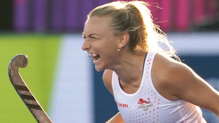 Hannah Martin celebrates scoring the winning goal in a semi-final shootout between England and New Zealand