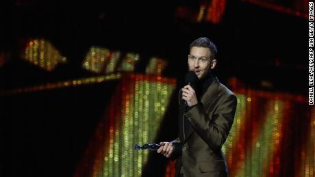 Calvin Harris collects an honor at the Brit Awards 2019 ceremony in London. 