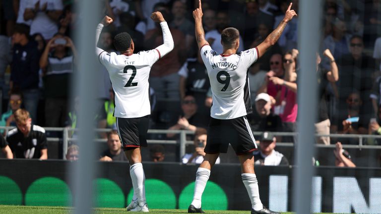 Mitrovic, right, celebrates after scoring the opener