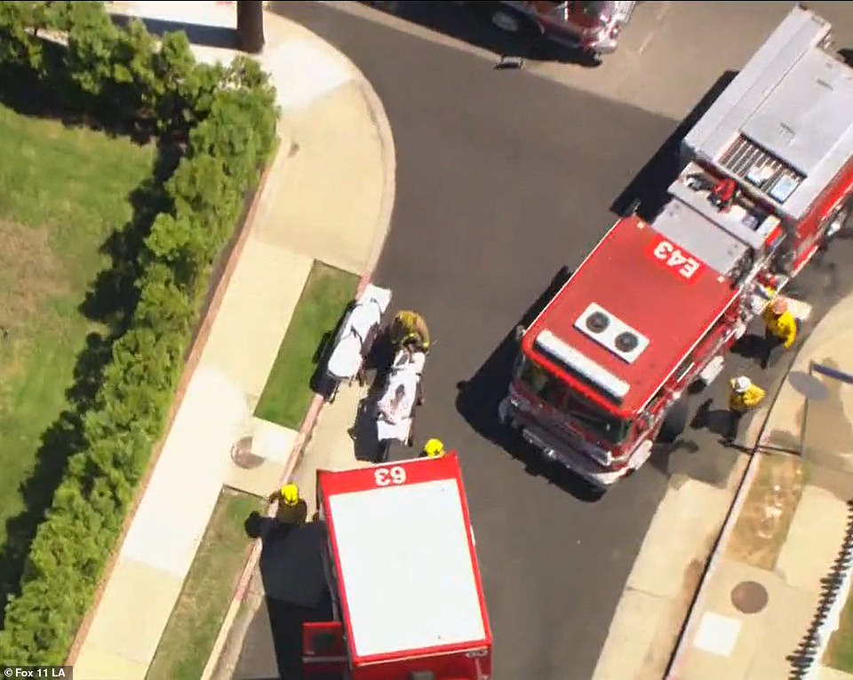 EMTs quickly ushered Heche into the back of an ambulance