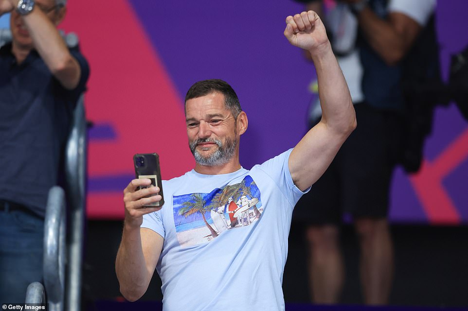 Fist pump: Fred was keen to celebrate after Andrea won the gold medal during her first Commonwealth Games