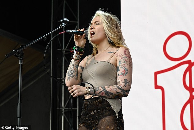 More than hobby: During a podcast interview, Paris explained how she loved art, from singing, to painting; pictured in May performing at the Boston Calling Music Festival