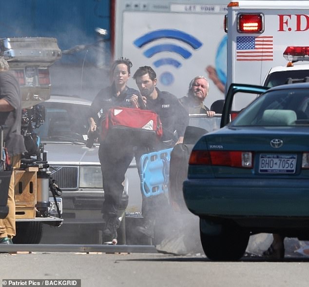 Prop: Dakota, daughter of Hollywood legends Melanie Griffith and Don Johnson, carried a large red bag with black straps