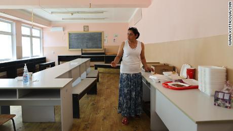 Ala Valentinovna Saviena prepares meals in the shelter in Chisinau.