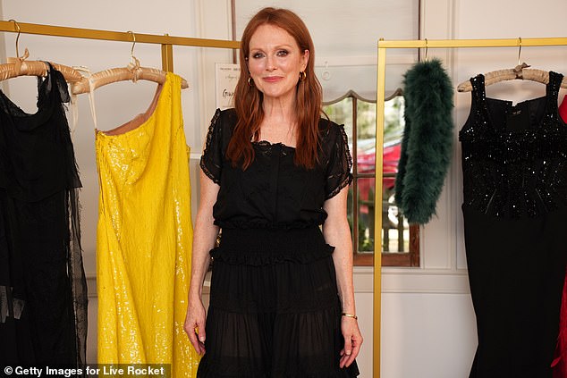 Looking great: The 61-year-old actress looked darling in the sheer and ruffled frock, pairing it with a black, open-toe platform shoe