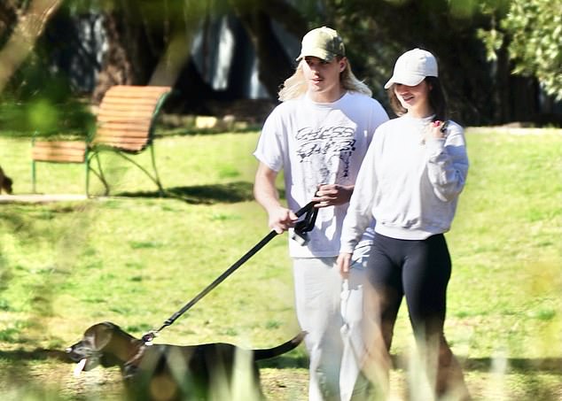 Gemma, meanwhile, looked effortlessly stylish in a white sweater and black trousers