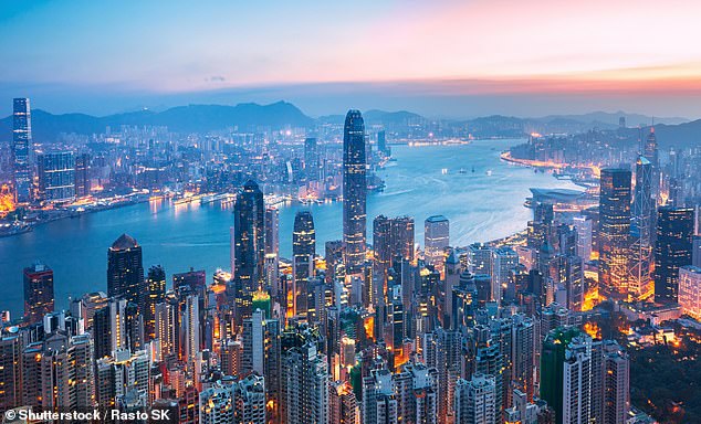 A midwife by profession, the 'one of a kind' mother 'lay in a breathless sleep' in her seat for the remaining eight hours of the flight until the plane landed in Frankfurt. Pictured: Hong Kong