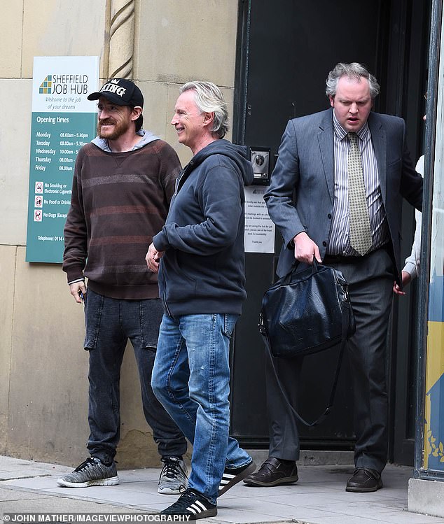 Smiling: Robert, Miles Jupp and another cast member had appeared pleased with their scenes