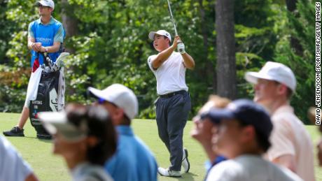 Kim hits the ball on the 13th hole during the final round.