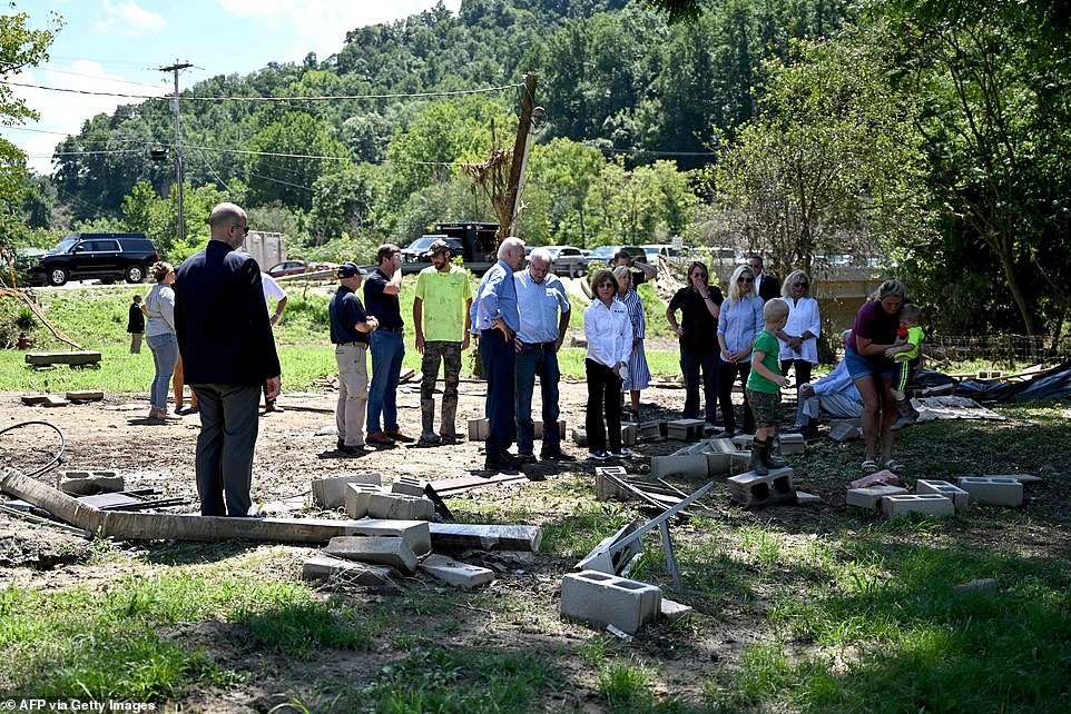 President Joe Biden meets with a family who lost their home to flood waters in Lost Creek