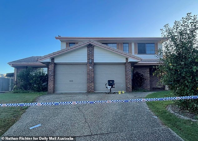 The 49-year-old man was arrested on Monday over the 'frenzied attack' and two 'bladed weapons' were taken from the scene (pictured, an office chair outside the home on Tuesday)