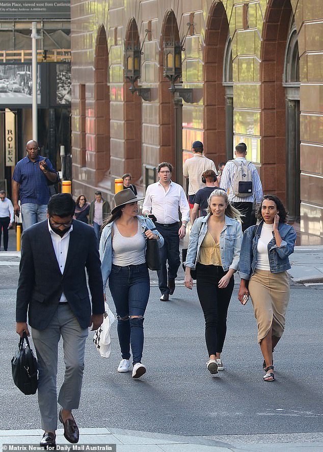 The Fair Work Ombudsman has launched up to 50 investigations into large corporations that have self-reported underpayments (pictured, Sydney commuters)