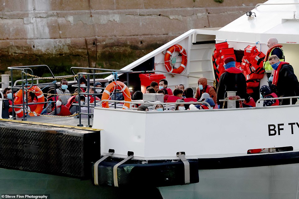 A second group of approximately 50 people arrived at the harbour on Border Force cutter Ranger at around 8am