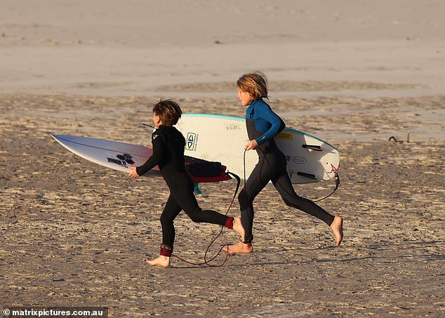 Siblings: India ran into the sea with one of her younger brothers