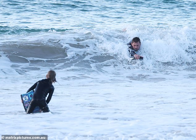 This is how it is done! Chris looked determined as he caught a wave