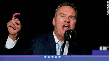 Wisconsin Republican gubernatorial candidate Tim Michels speaks as he appears with former President Donald Trump at a rally in Waukesha, Wis., on Aug. 5, 2022.