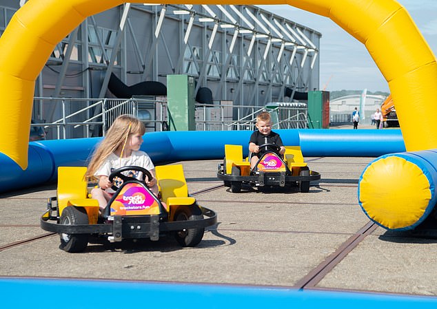 In gear: Organisers say it was intentional that the British Motor Show was taking place towards the end of the summer holidays — to attract families