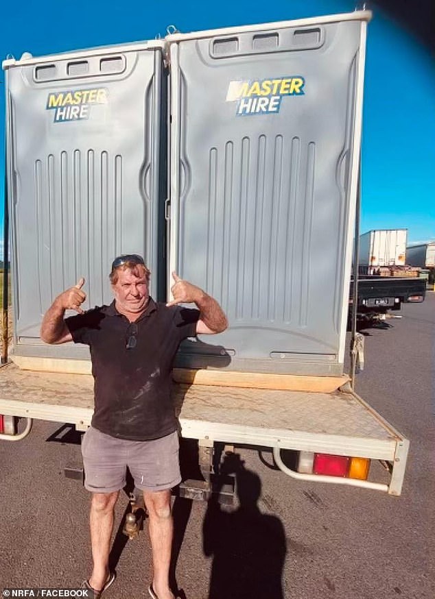 The two portable toilets will stay for now after a backflip from the Queensland government, thanks to the persistence of Wes Walker (pictured with the facilities)