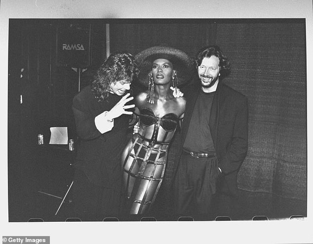 Paranoia: The music icon - who posed with his eyes bulging and his mouth wide open - explained: 'I was having my photo taken with Grace Jones and all of a sudden Eric was there. I was like, 'Oh my God, he's going to think I'm a total d*******'