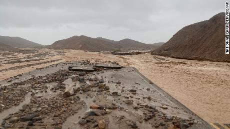 In this photo provided by the National Park Service, Mud Canyon Road is closed due to flash flooding in Death Valley, California.