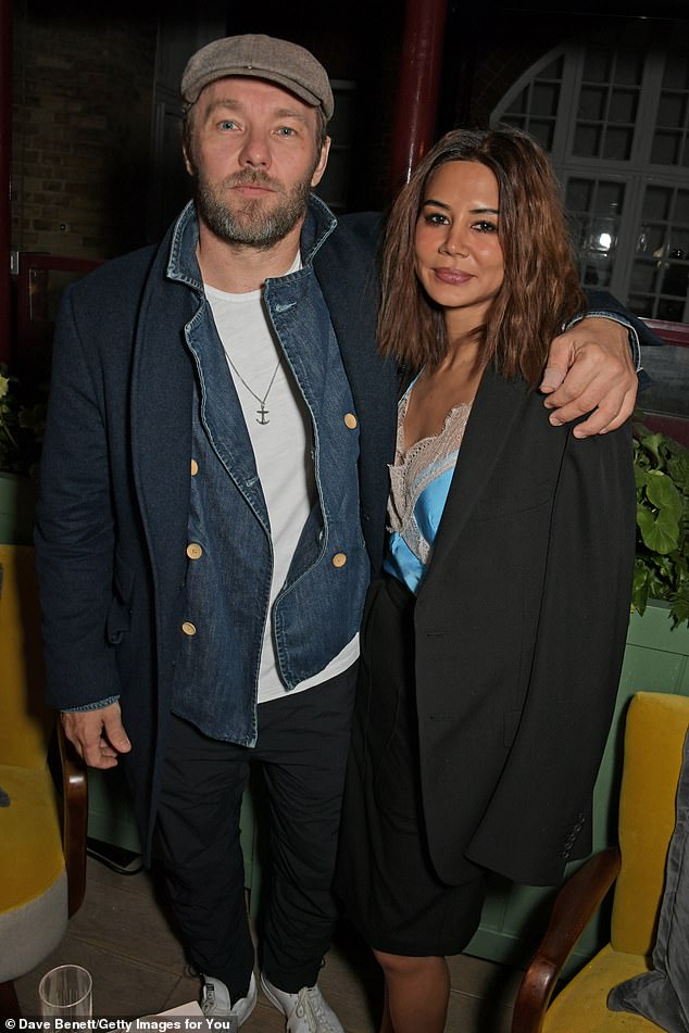 Joel and Christina seen in 2019 The couple debuted their relationship at GQ Australia's Men of the Year Awards in Sydney in November 2018