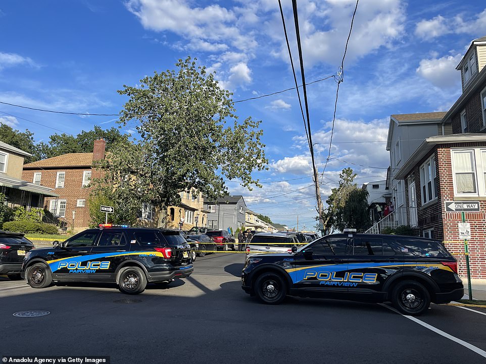 Pictured: A view from the house of attack suspect 24-year-old Hadi Matar, as FBI members and police carry out a search