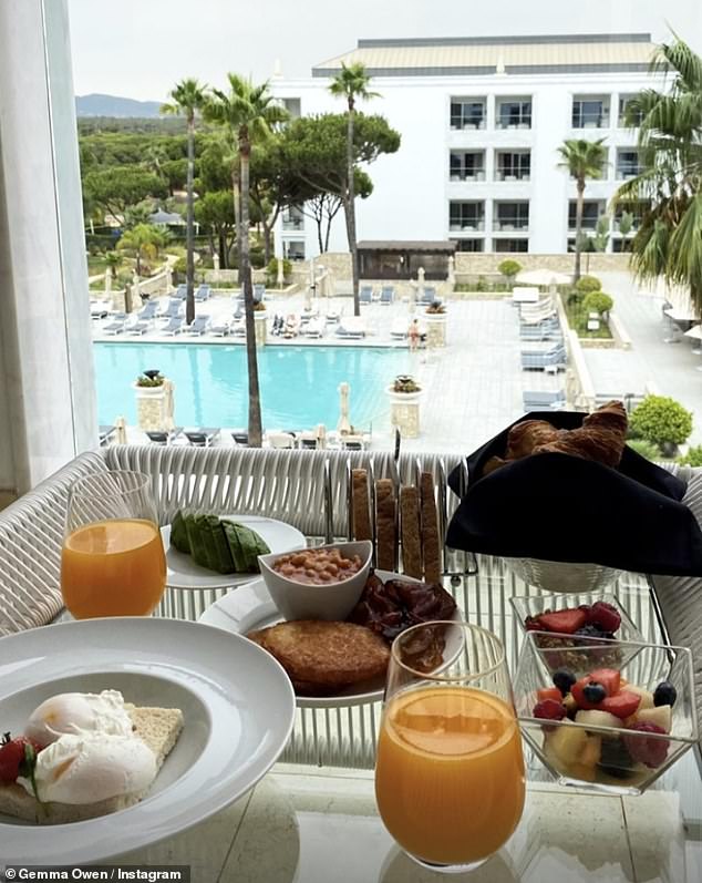 Fun in the sun: Earlier in the day, the couple enjoyed a healthy breakfast while looking over the pool at their lavish hotel