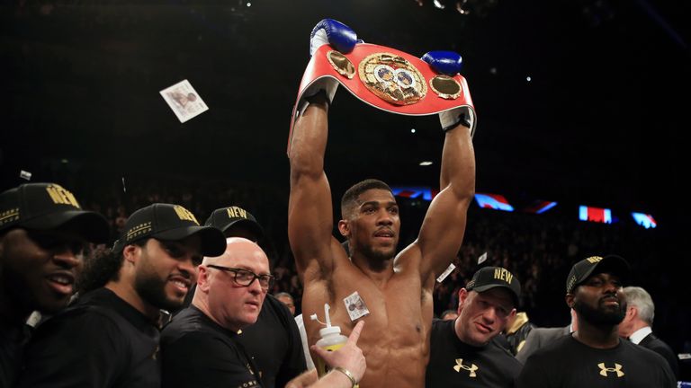 Anthony Joshua celebrates beating Charles Martin in the IBF Heavyweight World Championship title bout at the 02 Arena, London. PRESS ASSOCIATION Photo. Picture date: Saturday April 9, 2016. See PA story BOXING London. PRESS ASSOCIATION Photo. Picture date: Saturday April 9, 2016. See PA story BOXING London. 
