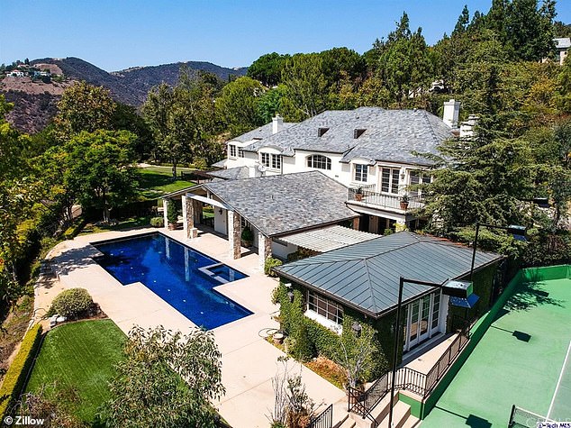 The Brentwood mansion has six bedrooms and 9 bathrooms. The property features a lap pool and a tennis court in the backyard.  The home offered spectacular views of downtown Los Angeles, the Santa Monica Mountains, and the Pacific Ocean