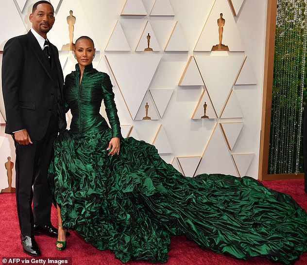 As seen on the red carpet: Will was seen initially laughing at the joke, but Jada rolled her eyes and he stormed onto the stage to give Chris a smack across the face