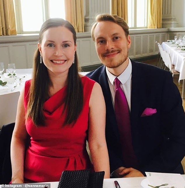 Ms Marin, who spent her teenage years working in a bakery, said her mother has always been very supportive and made her believe she could do anything she wanted. Pictured with her husband