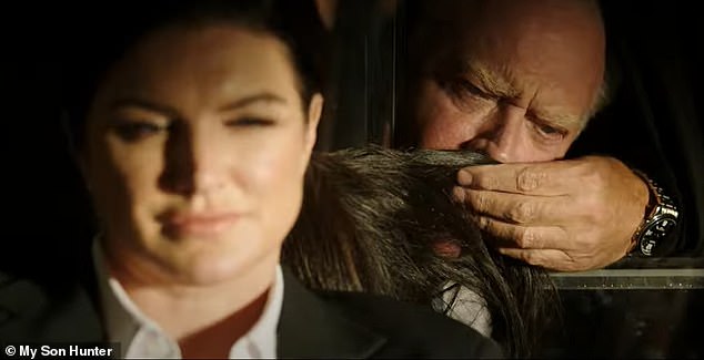 A still grab of the 23-second teaser film shows James' character sniffing the hair of Carano's character ¿ a nod to several images of the president standing uncomfortably close or inappropriately touching women and young children