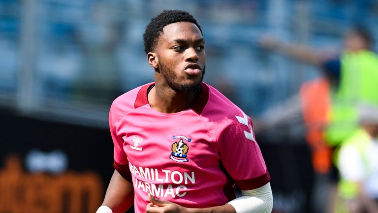 KILMARNOCK, SCOTLAND - AUGUST 14: Kilmarnock&#39;s Deji Sotona warms up during a cinch Premiership match between Kilmarnock and Celtic at Rugby Park, on August 14, 2022, in Kilmarnock, Scotland. (Photo by Rob Casey / SNS Group)