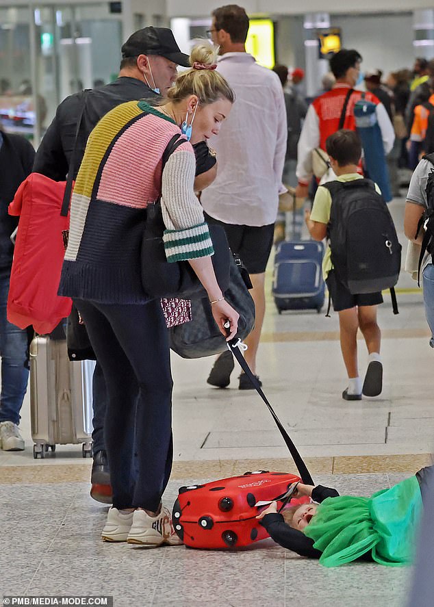 The luggage case is a child's ride-on bag designed for kids, equiped with handles for children to hold on to and is claimed to be safe for young ones to use