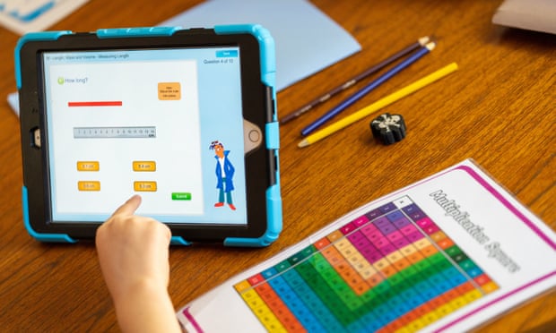 A child does maths activities on an iPad