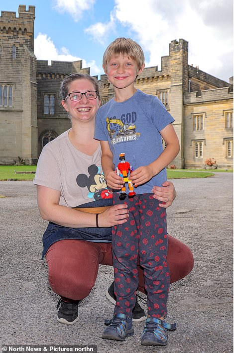 Ulrike Hobbs, 26, and her son Eli, 6, who live in Brancepeth's 12th Century castle. The mother-of-two, who is originally from Germany, said: 'At first, I was worried about moving somewhere so rural but it¿s such a wonderful place to live. People welcomed us as soon as we arrived'