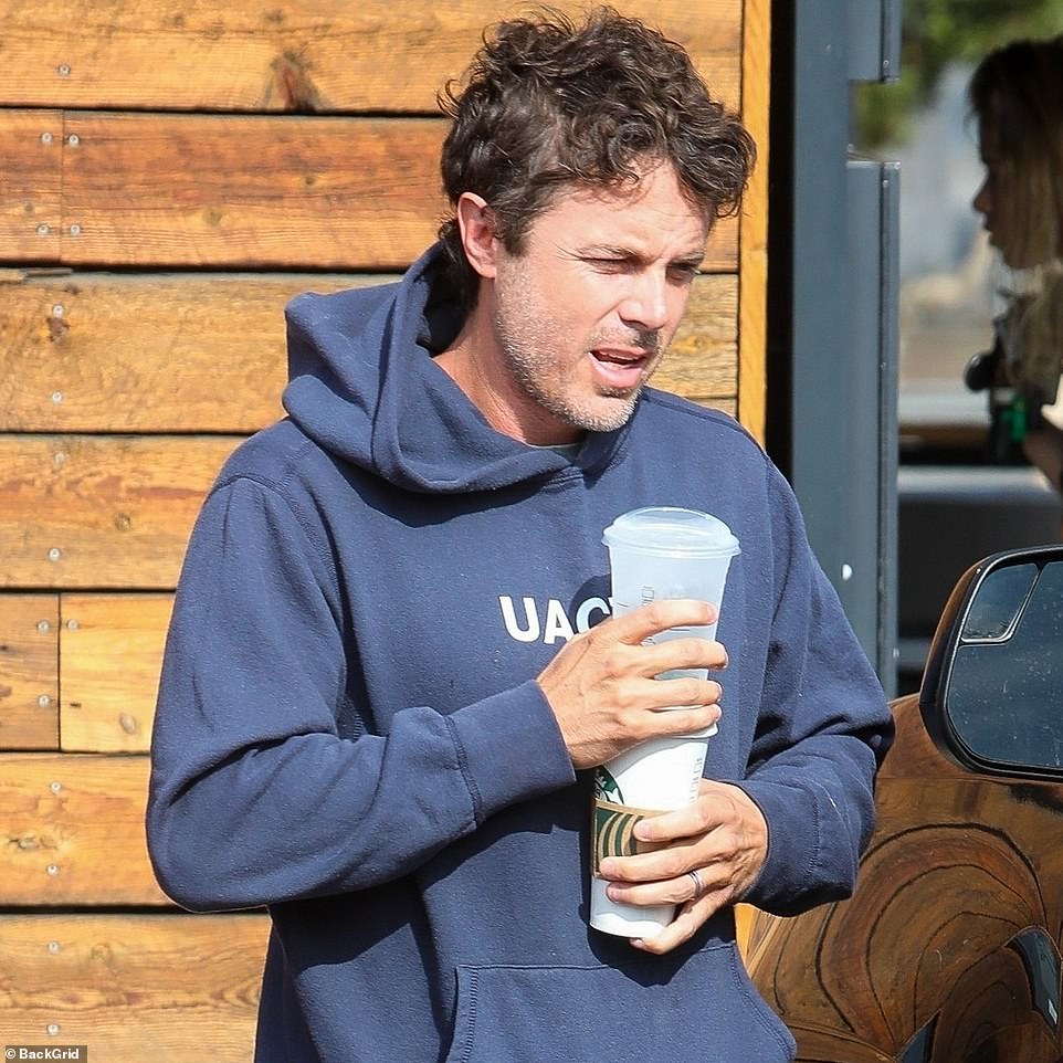 Casey Affleck was spotted carrying a pair of cups from a Starbucks in Los Angeles on Friday morning. He appeared to tell a photographer he had fallen asleep and wouldn't be able to make his brother's wedding