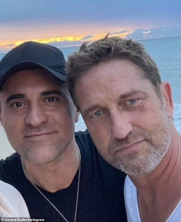 Friends: He had become close friends with Gerard Butler, a fellow Scot, and he was among the last people to be pictured with him before his death (Darius and Gerard pictured)