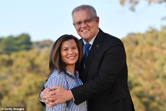 Mr Morrison, here seen with wife Jenny, secretly took on five ministerial portfolios while prime minister