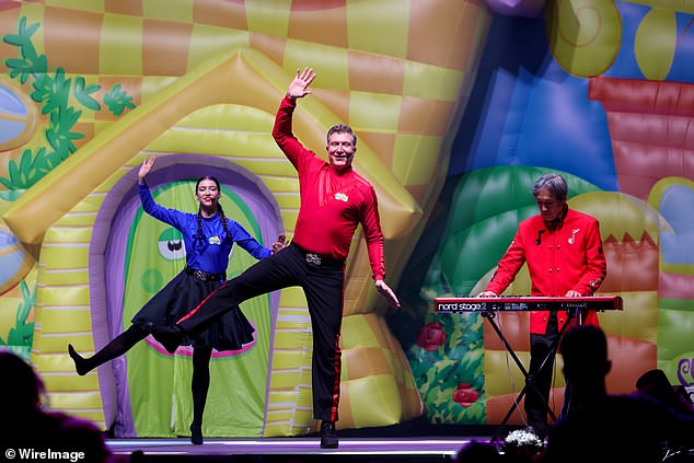 Lucia couldn't wipe the smile off her face as she danced on stage with the group, including her 'Blue Wiggle' father Anthony