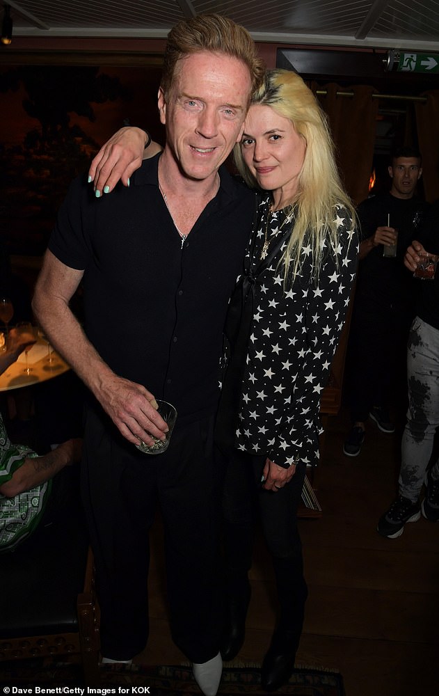 Sweet: Lewis and Mosshart confirmed their romance as they cosied up for a photo together at private members' club The House of KOKO's bash in July