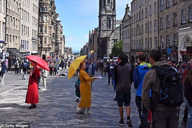 Graham said: 'It's great to see the Edinburgh Fringe back up and running again, it's my spiritual home.' Pictured: Edinburgh during the Fringe on July 17