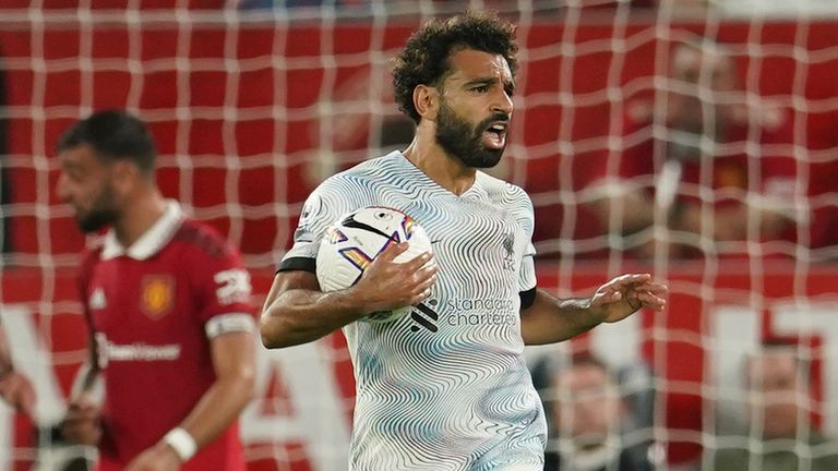 Liverpool&#39;s Mohamed Salah celebrates after scoring against Manchester United