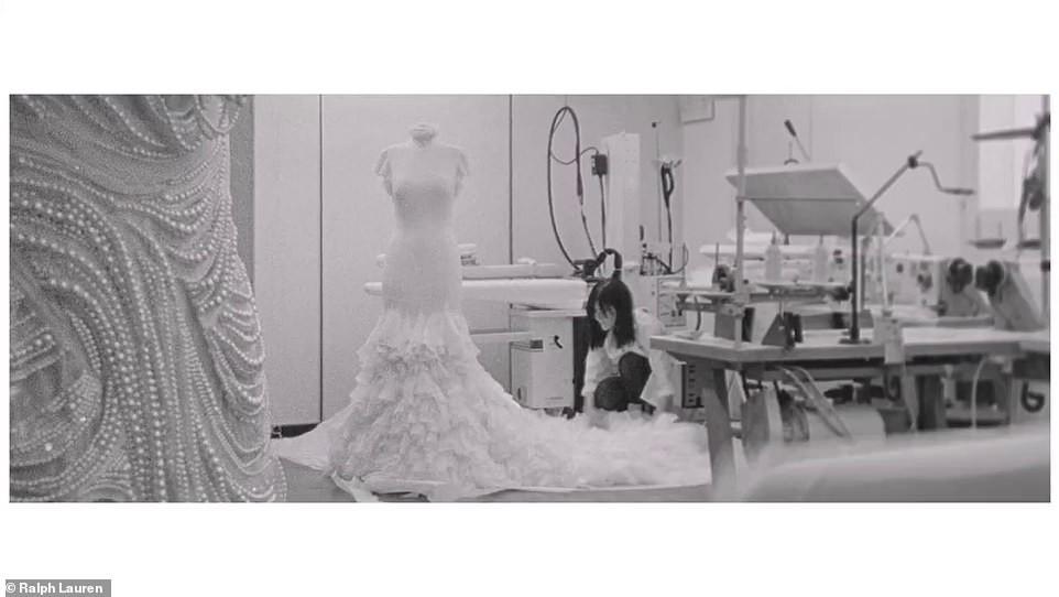 Wow: A seamstress worked on the train of the dress