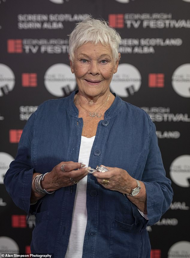 Sweet: The veteran actress had the sentimental item mended (pictured) as part of a special live session of the BBC One show held at the Edinburgh TV Festival